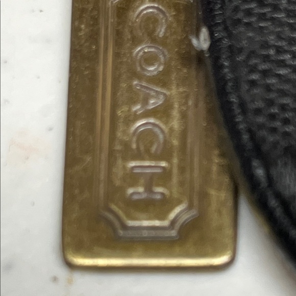 Coach Black and Gold Wristlet